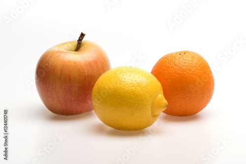 orange, lemon and apple fruit isolated on white