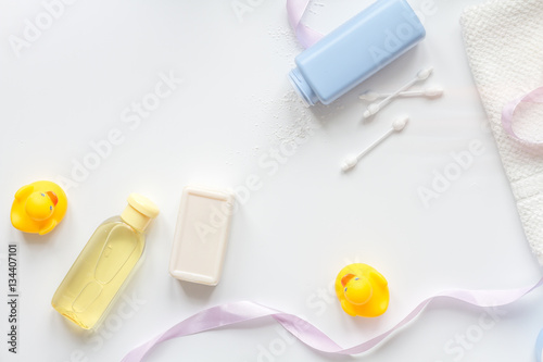 Fototapeta Naklejka Na Ścianę i Meble -  baby accessories for bath with duck on white background