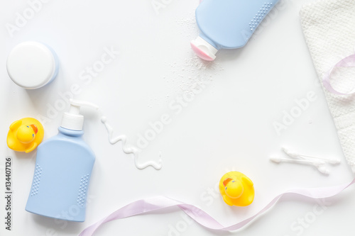 baby accessories for bath with duck on white background