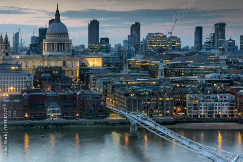 LONDON, ENGLAND - JUNE 18 2016: Night photo of Millennium Bridge, Thames River and  St. Paul Cathedral, London, Great Britain © Stoyan Haytov