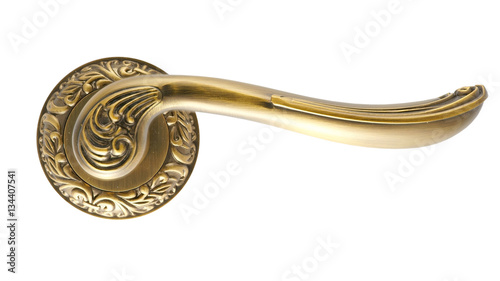 Door handle of gold on a white background front view