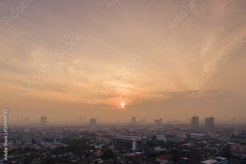 background of sun rise in the city at morning time