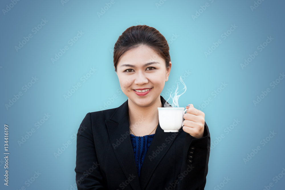 Business woman showing coffee cup with smiling in isolated Business woman showing coffee cup with smiling in isolated