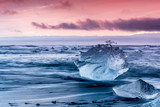 Iceberg on Jokulsarlon glacial lagoon beach