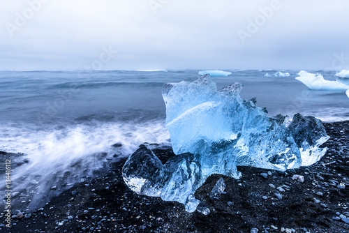 Iceberg on Jokulsarlon glacial lagoon beach