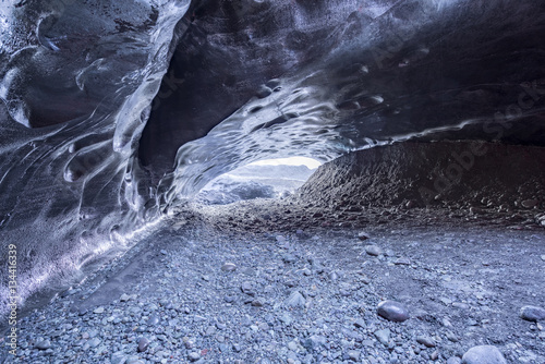 Volcanic charcoal ice cave in Iceland