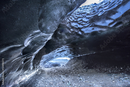 Volcanic charcoal ice cave in Iceland