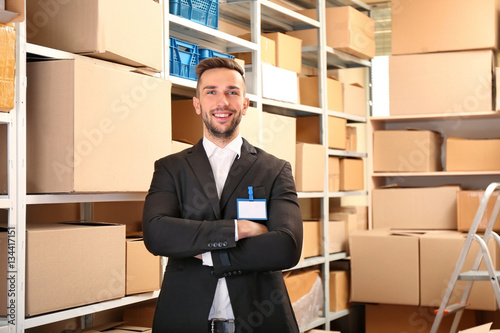 Young businessman at warehouse © Africa Studio