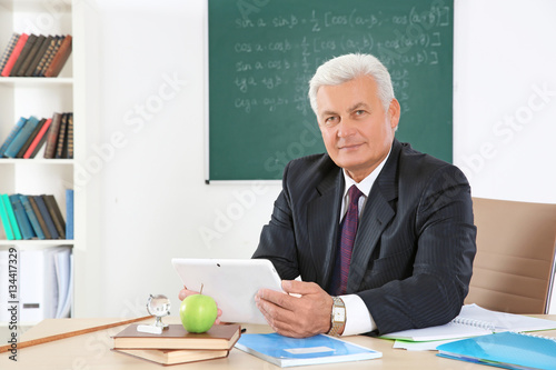 Senior teacher at lesson in...
