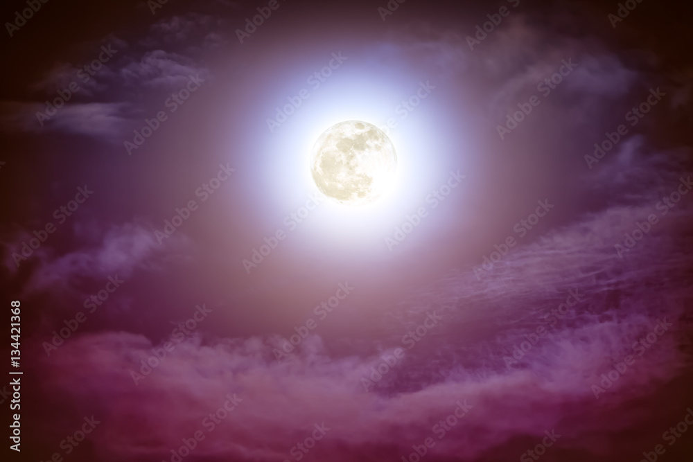 Fototapeta premium Nighttime sky with clouds and bright full moon with shiny.
