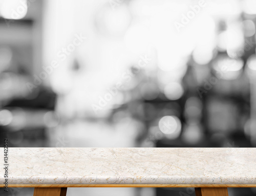 Empty marble table top with leg with black and white people siti