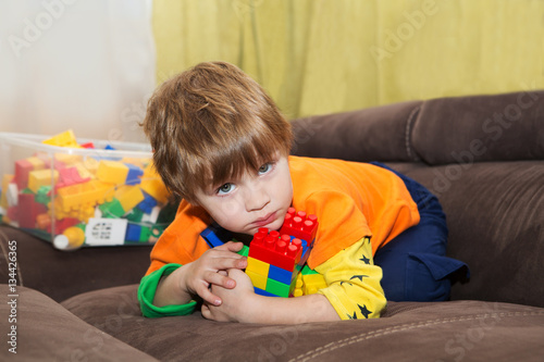 Fototapeta two kids conflict for plastic blocks constructor indoor