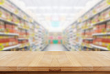 Empty table on blured supermarket background