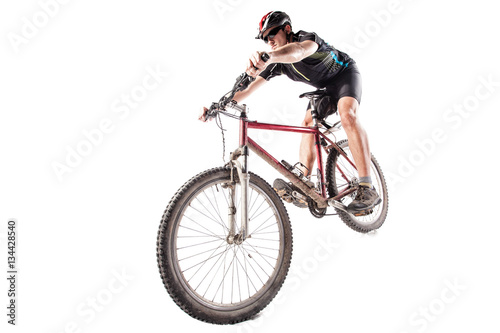 Fototapeta Naklejka Na Ścianę i Meble -  Bicyclist on a dirty bike