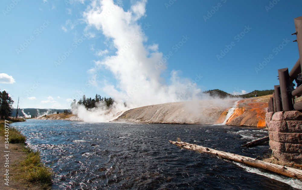 Firehole River flowing past the Midway Geyser Basin in Yellowstone National Park in Wyoming USA