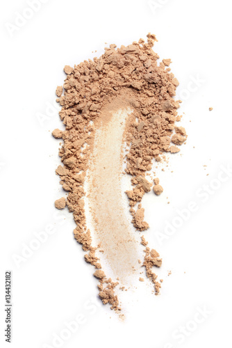 Smear of crushed beige face powder
