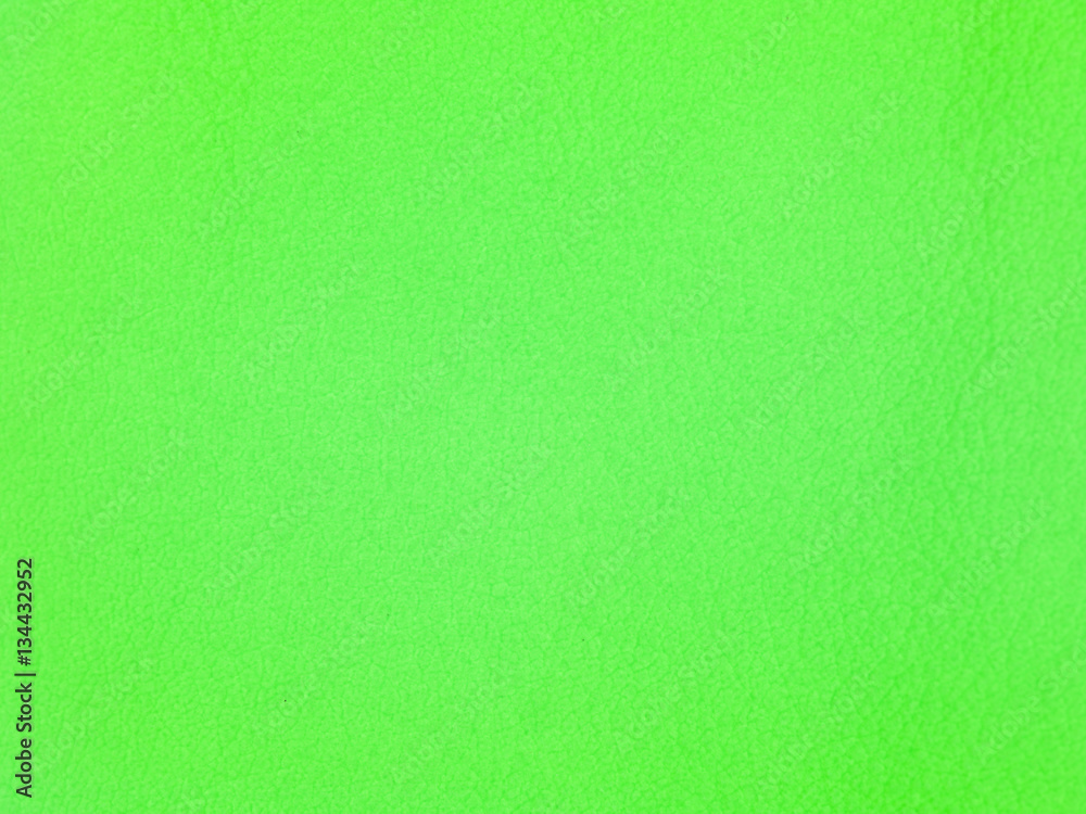green background, fabric close up 