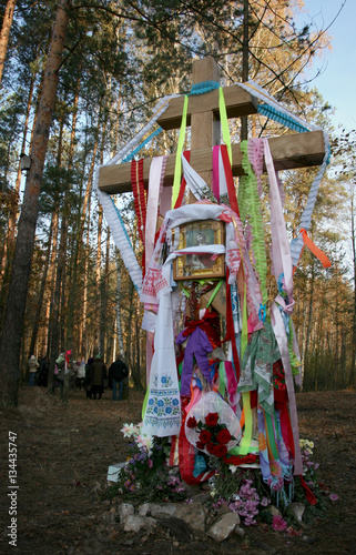 Orthodox wooden cross with ribbons as a sign of gratitude © Mykola Komarovskyy