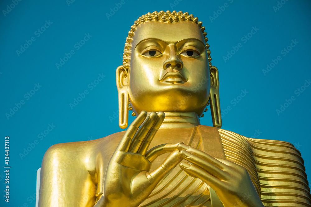 Golden lord Buddha statue in Sri Lanka
