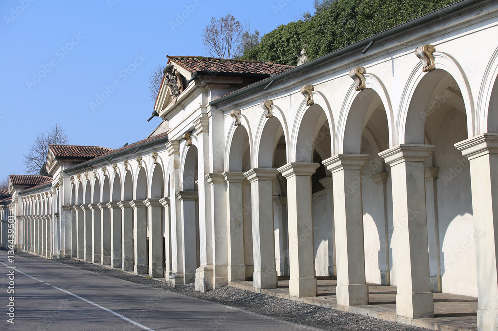 long line of architectural arcades on the uphill road leading to