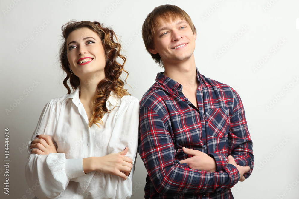 A loving couple posing in studio. A loving couple posing in studio.