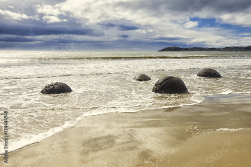boulders at the beach of Moeraki New Zealand © magann