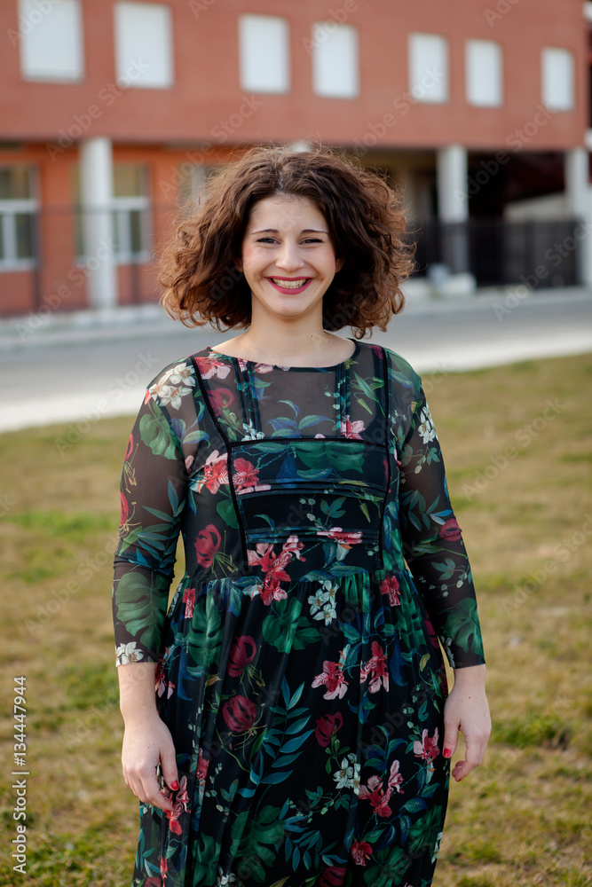 Happy curvy girl with curly hair in the street Happy curvy girl with curly hair in the street