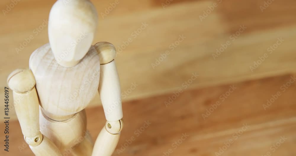 Conceptual image of figurine performing stretching exercise 4k Conceptual image of figurine performing stretching exercise 4k
