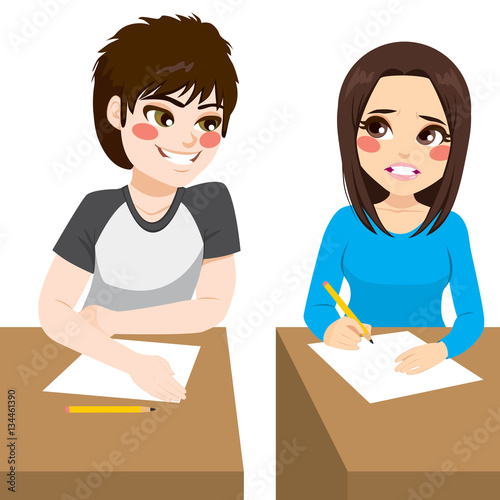 Young boy copying his classmate girl on exam