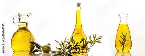 Extra virgin olive oil three bottles isolated