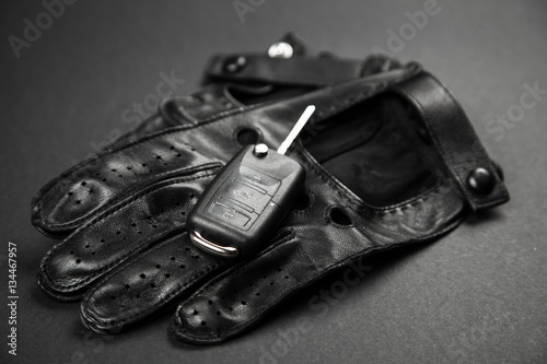 Car keys and driving gloves