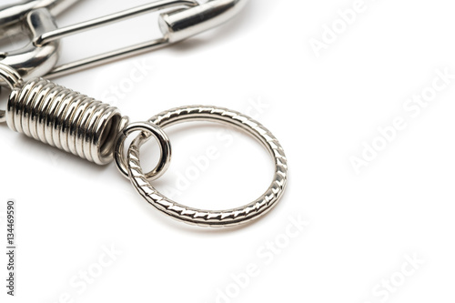 silver coil spring of carabiner keychain or keyring on white bac