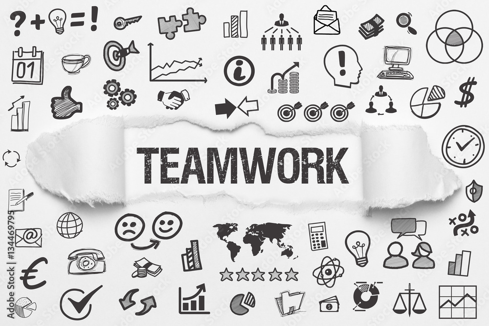 Teamwork / weißes Papier mit Symbole