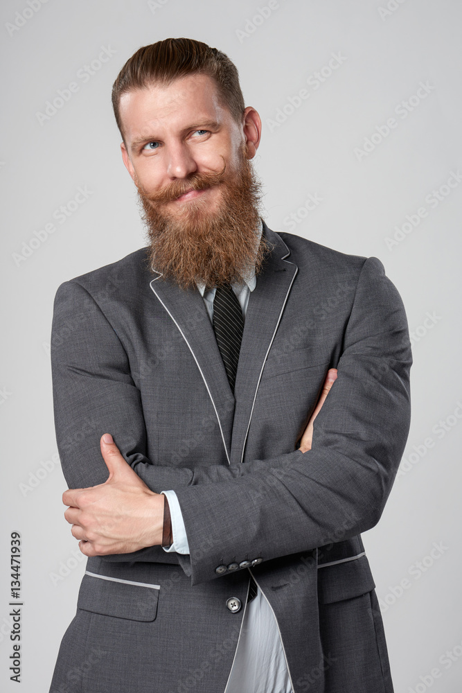He's a bit skeptical. A young business man looking skeptically to the side He's a bit skeptical. A young business man looking skeptically to the side