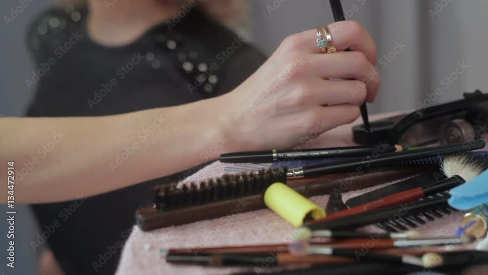 Professional brush set for make-up lying on the table Professional brush set for make-up lying on the table