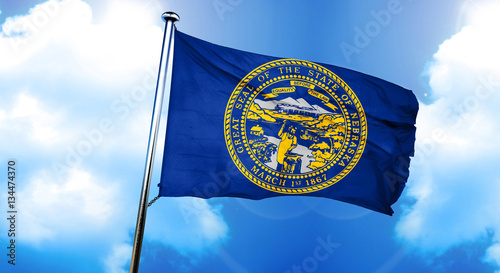 nebraska flag, 3D rendering, on a cloud background