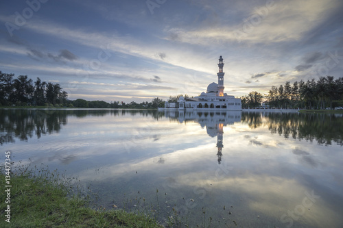 Tengku Tengah Zaharah Floating Mosque in Kuala Terengganu, Malaysia at sunset