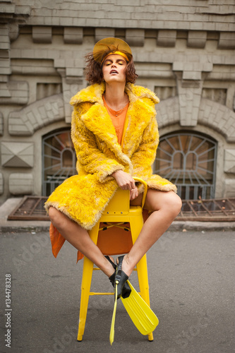 Yellow fashion image. The theme of spring and sun colors photo