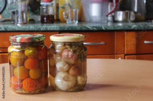 tomatoes and garlic, canned photo