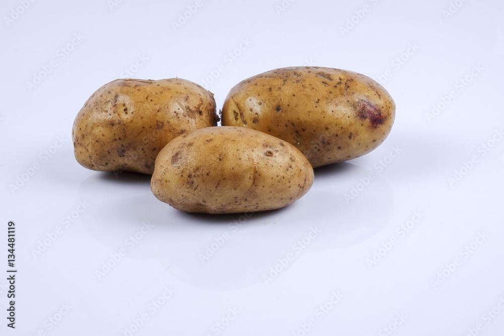 Fresh raw potato on white background. Fresh raw potato on white background.