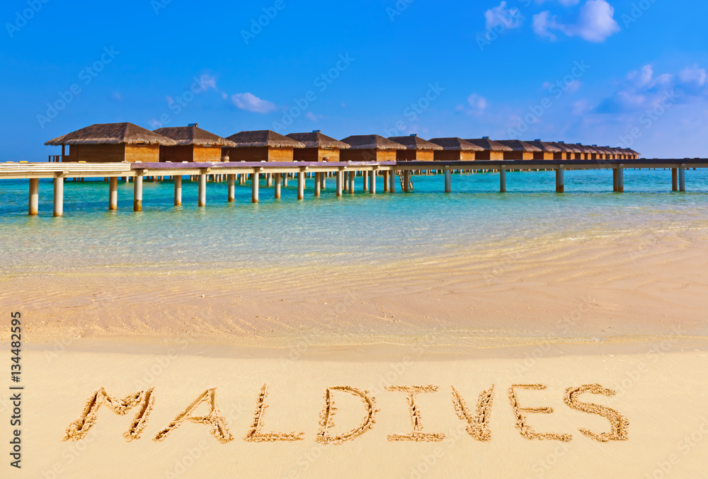 Word Maldives on beach