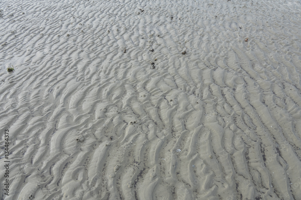 Obraz premium Sand pattern of a beach as background.