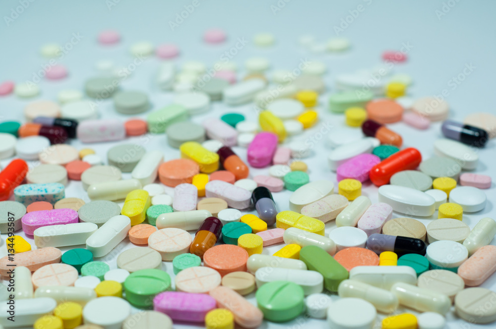 assorted pills and capsules in medicine