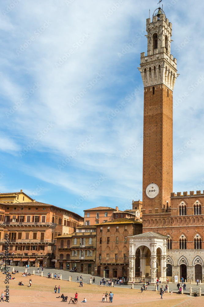 Piazza del Campo with Palazzo Pubblico and Torre del Mangia bell tower in Siena, Italy