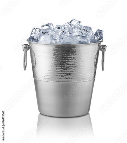 Metal champagne bucket, full with ice. Isolated on white