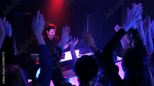 Wedding Guests Dancing in a Nightclub photo