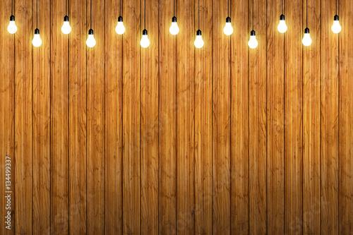 wood wall with bulb lights lamp. nice brick show room with spotl photo