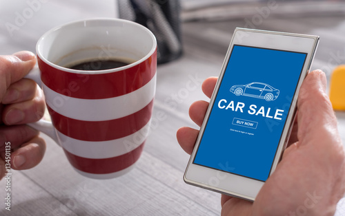 Car sale concept on a smartphone