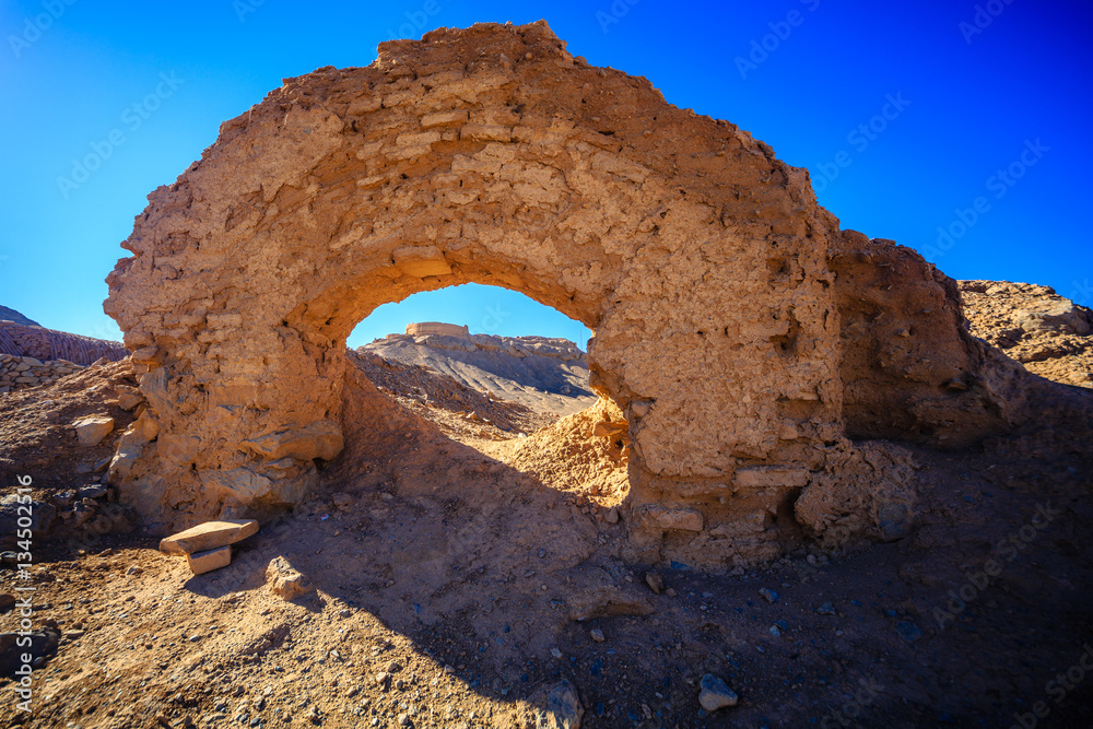 Ruins near the Tower of Silence, or Dakhma,is a Zoroastrian structure which was used for exposure of the dead body for sky burial .