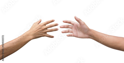 couple of helping/praying hand while background,support/ aid/love/trust / healthcare/ therapy/healing /affection / friends and family concept.